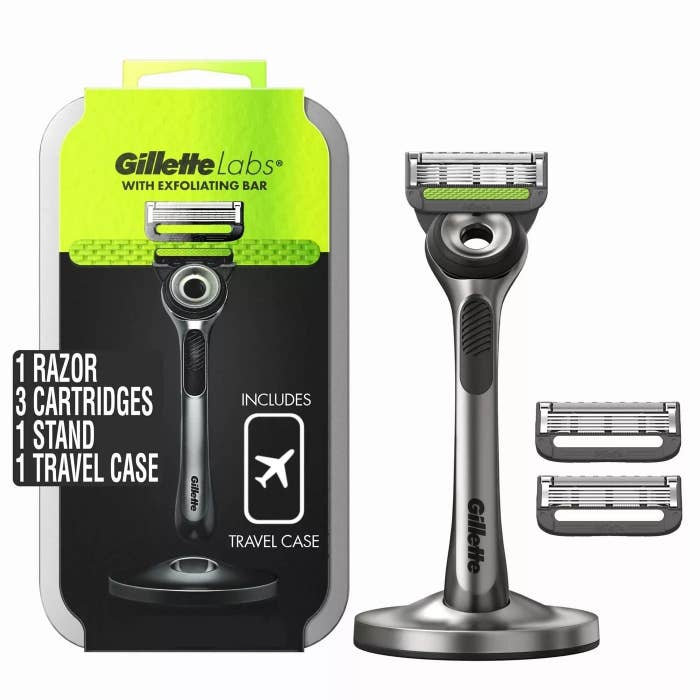 The Gillette Labs razor with two extra razor heads and a stand