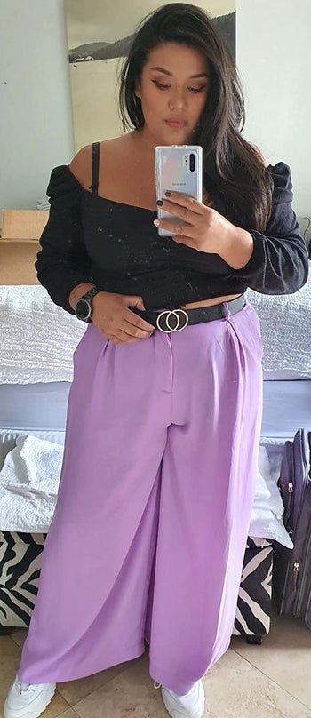reviewer wearing the lavender pants
