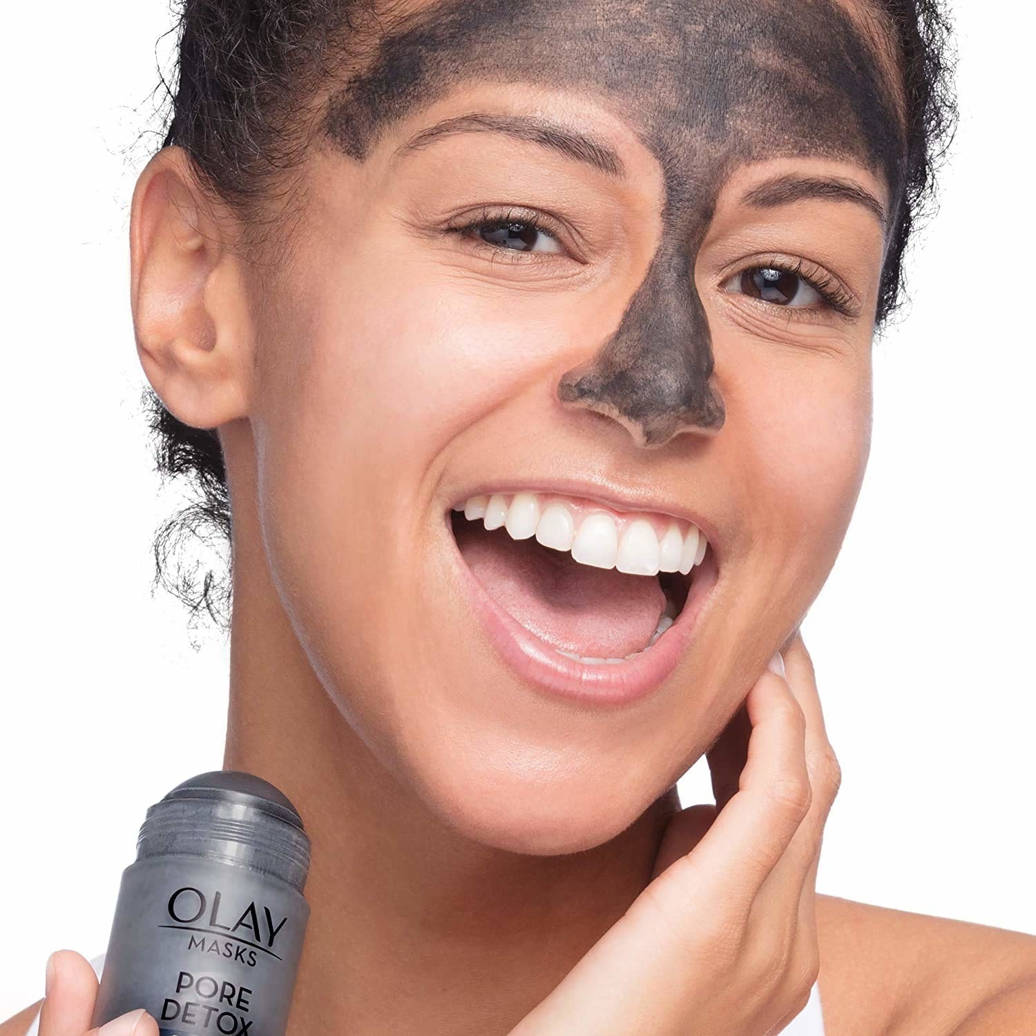 model with clay mask on forehead and nose
