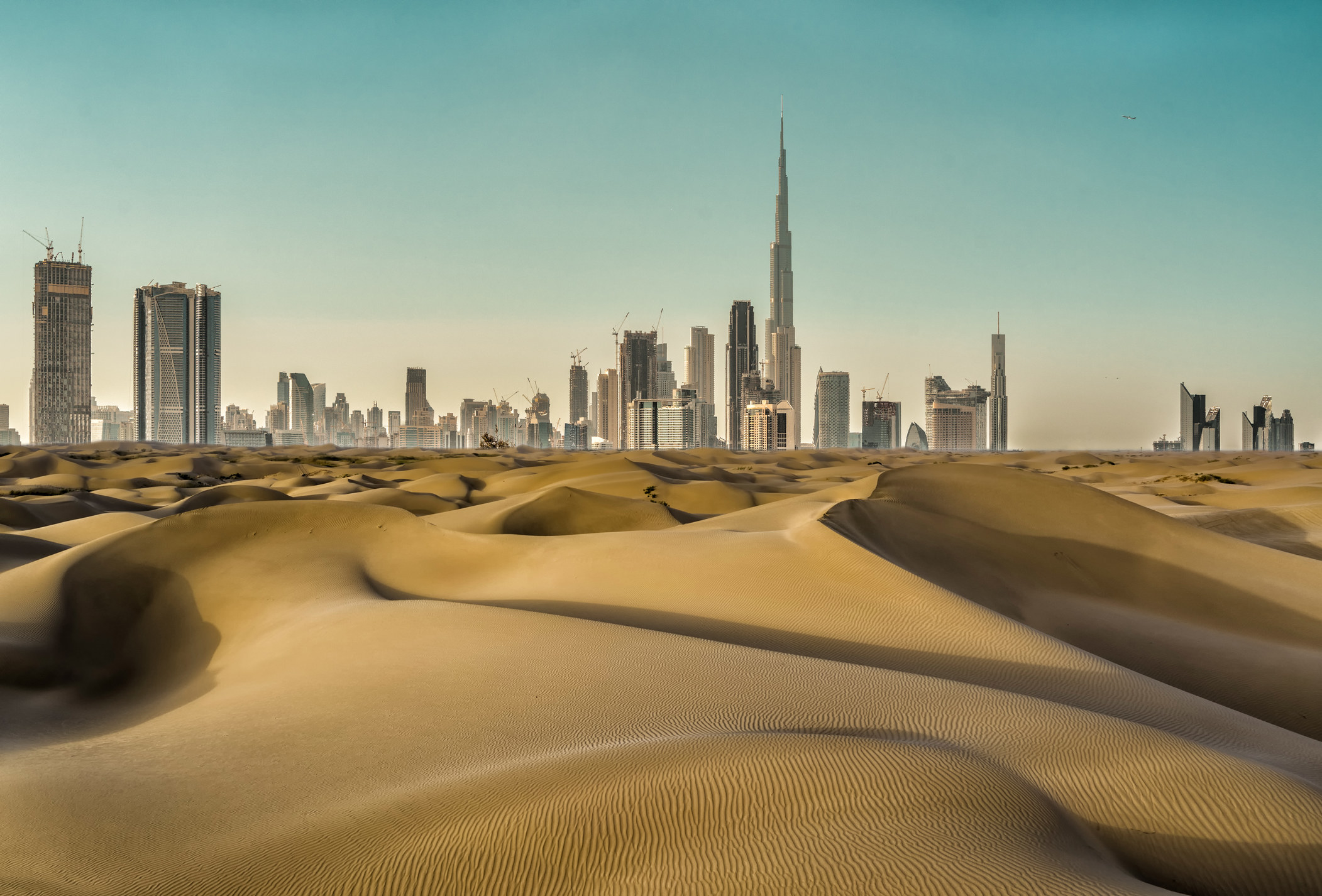Dubai skyline and desert.