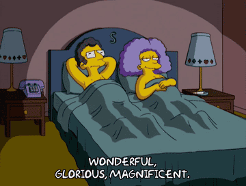 Two Simpsons characters in bed, one saying &quot;wonderful, glorious, magnificent&quot;