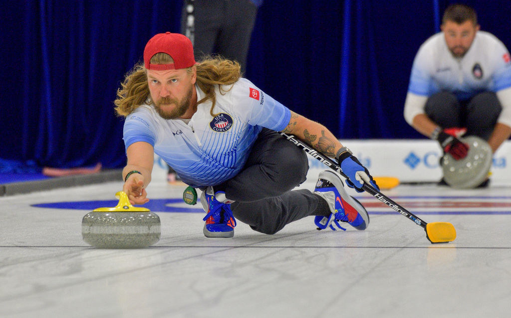 an American curler practices on the ice
