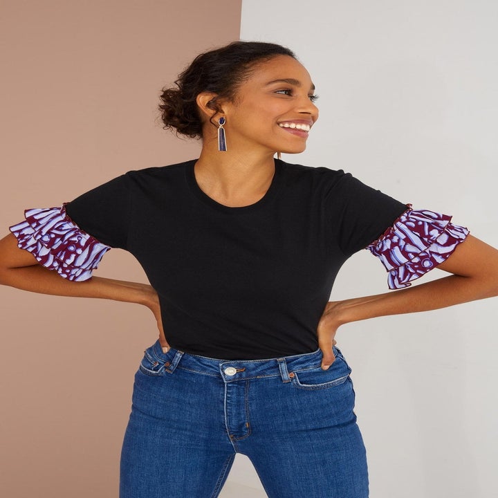 model wearing the black tee