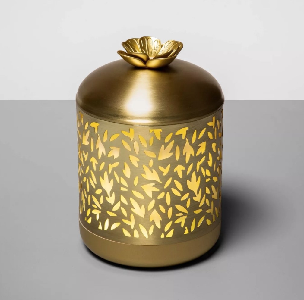 The gold floral cutout diffuser