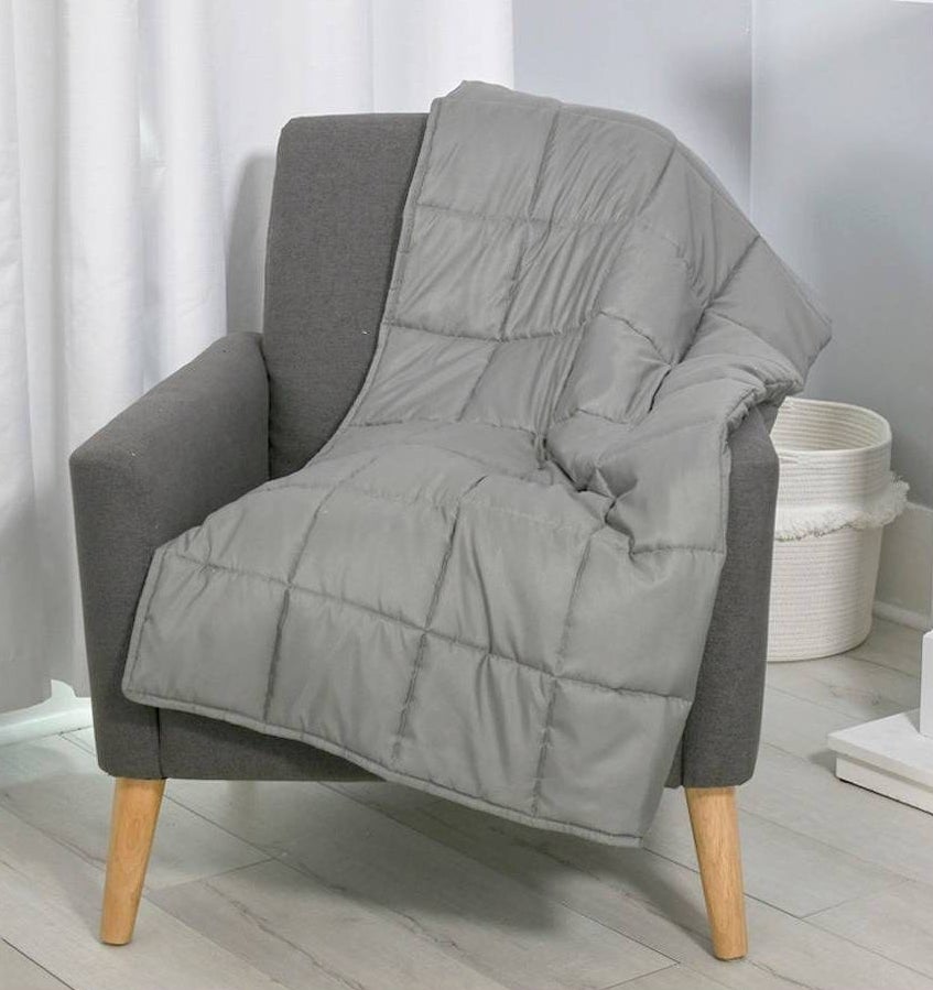 grey weighted blanket on a chair