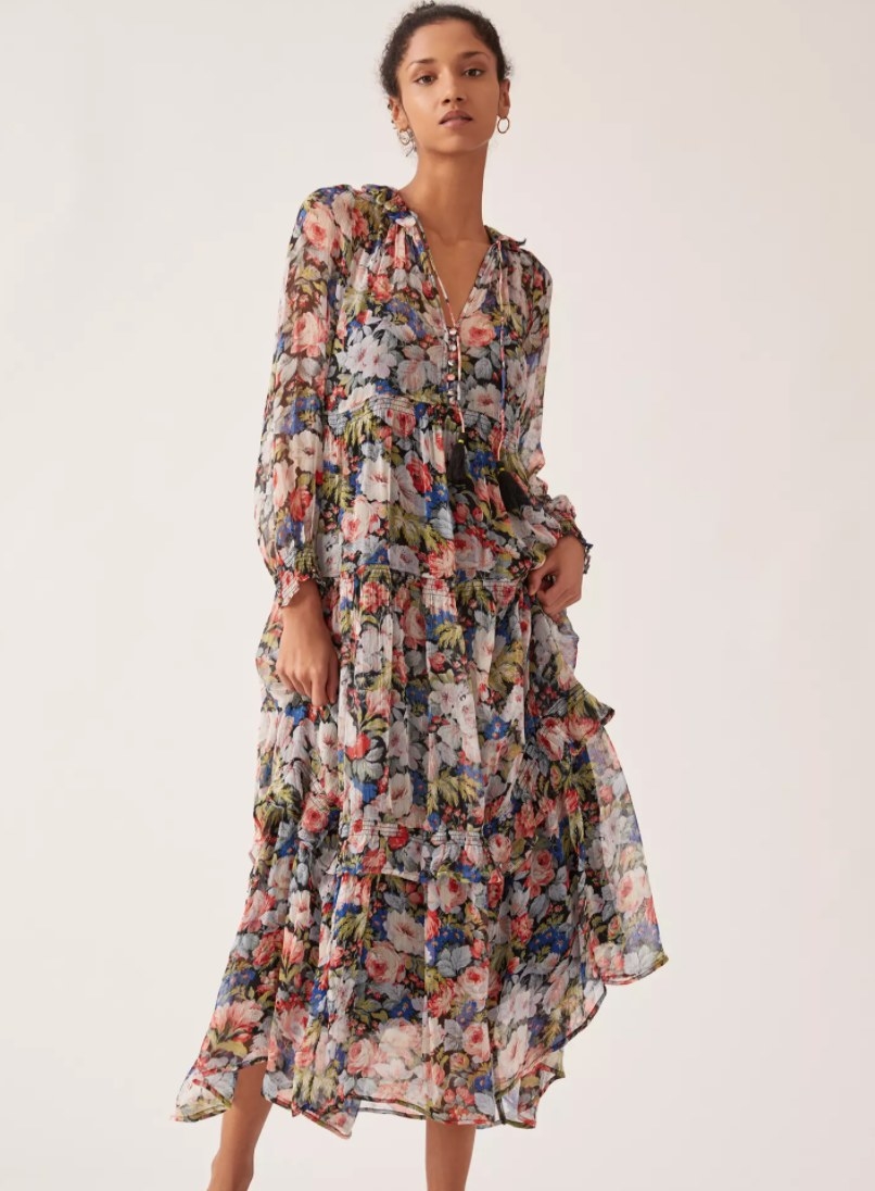 a model wearing the floral maxi dress
