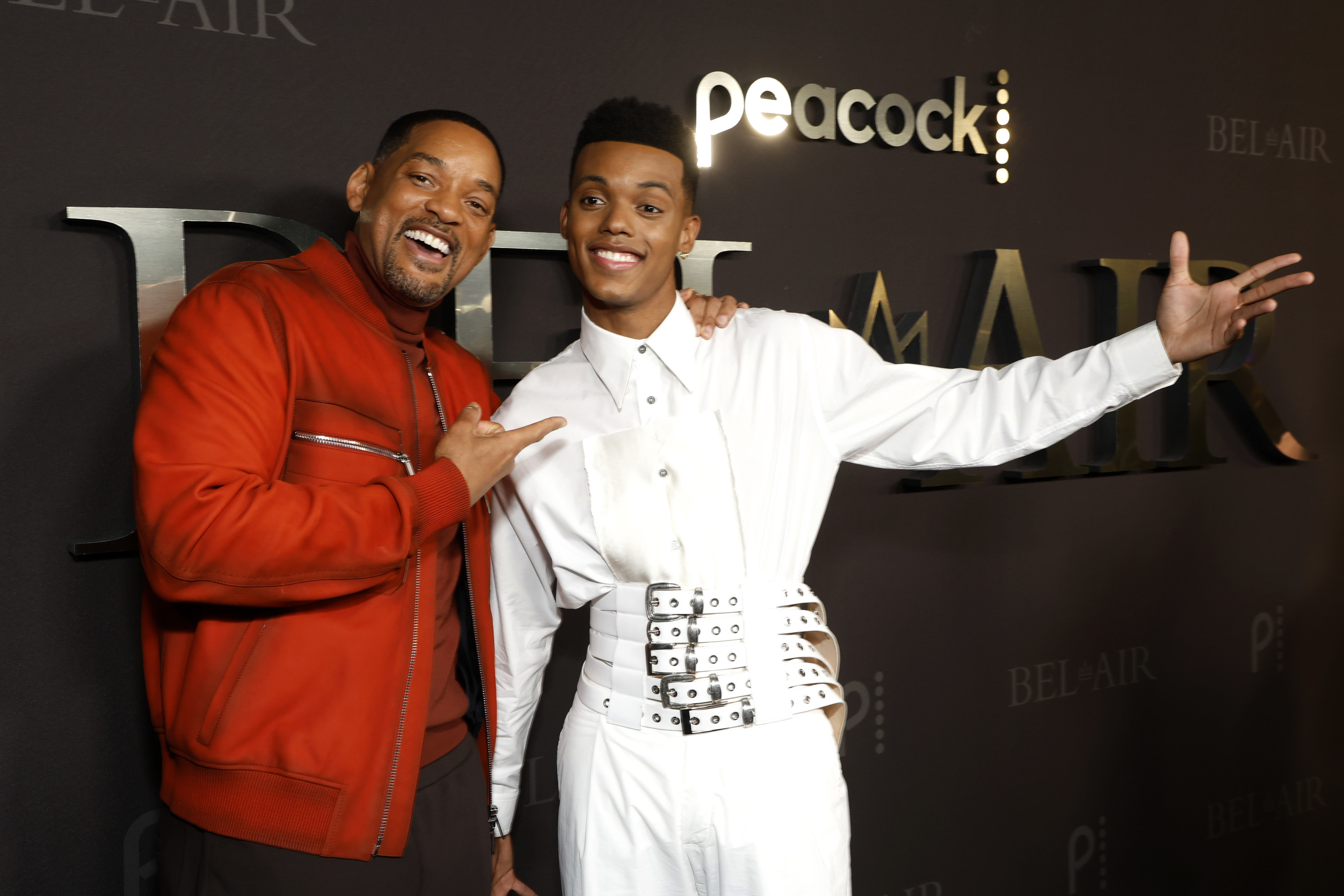 Will Smith and Jabari Banks pose together at the Peacock premiere of Bel-Air.