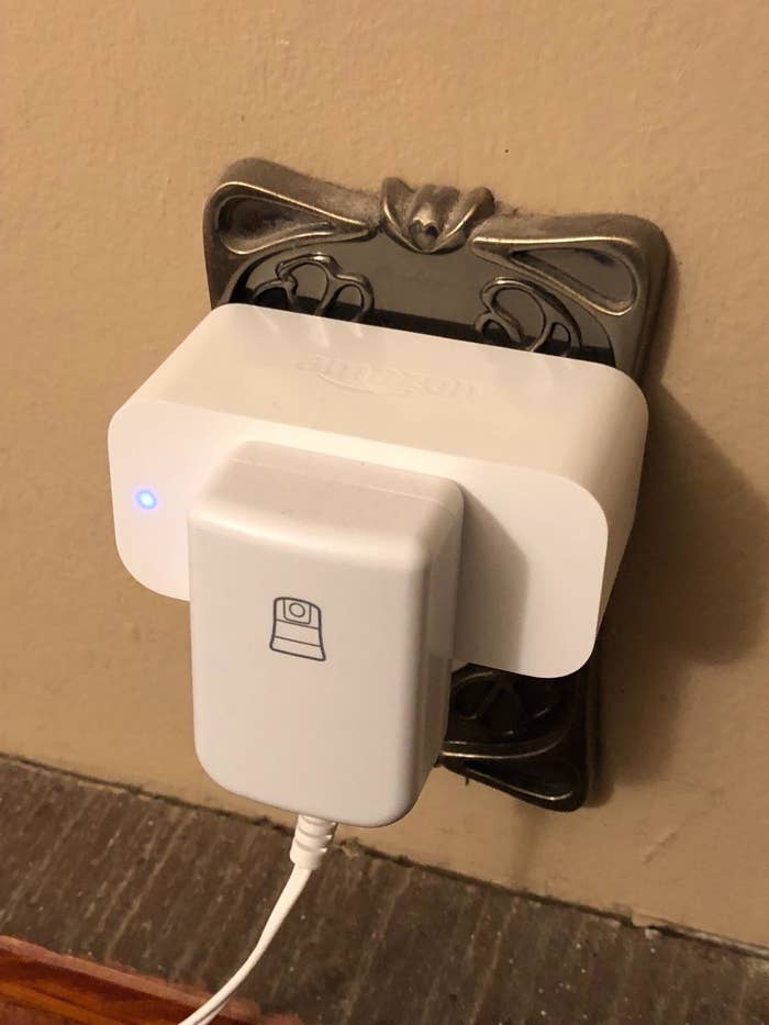 reviewer image of the rectangle-shaped smart plug in white