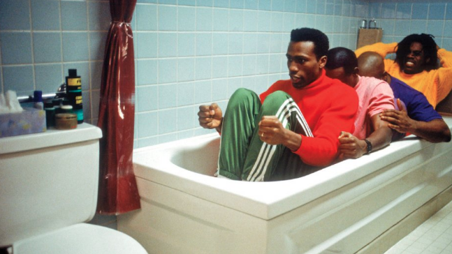 The bobsleigh team from Cool Runnings all squished into a bath together to practice