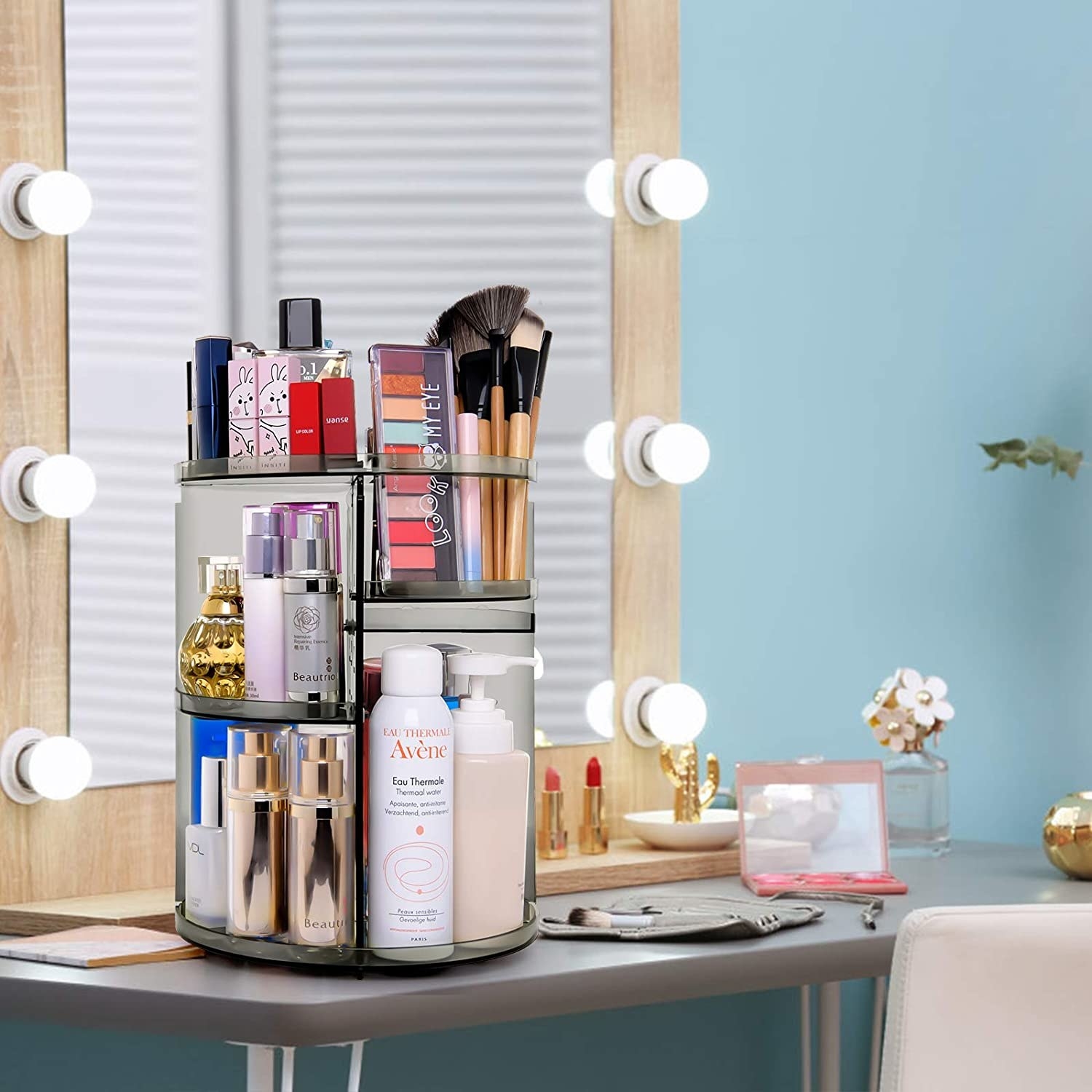 The filled makeup carousel on a vanity