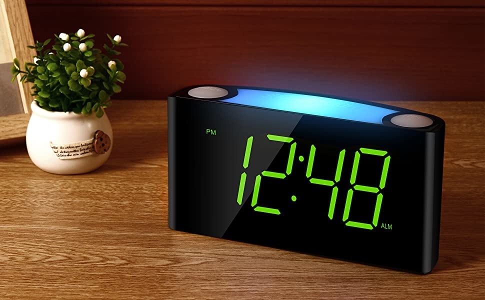 The alarm clock on a wooden table