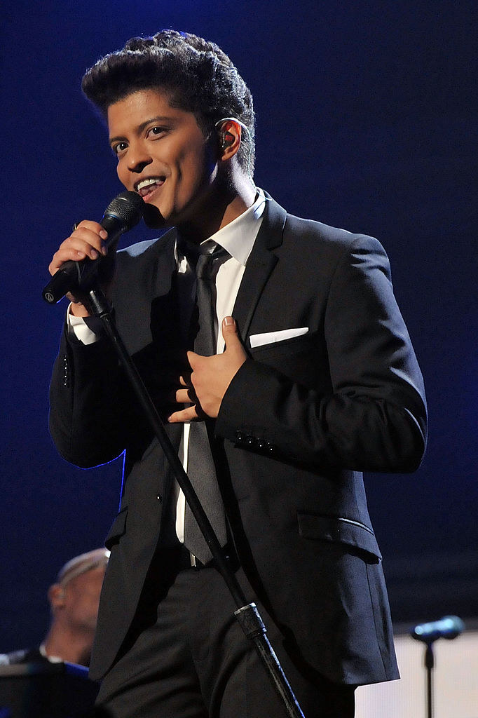 Bruno Mars singing on stage