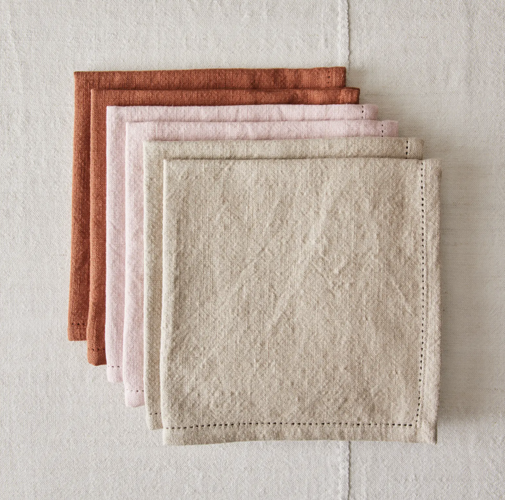 the set of neutral colored napkins
