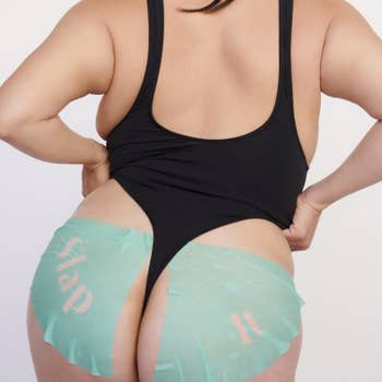 model wearing the teal mask on their butt cheeks