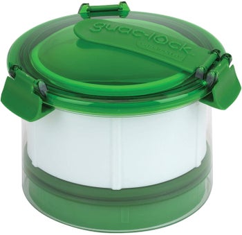 The clear and green cylindrical container