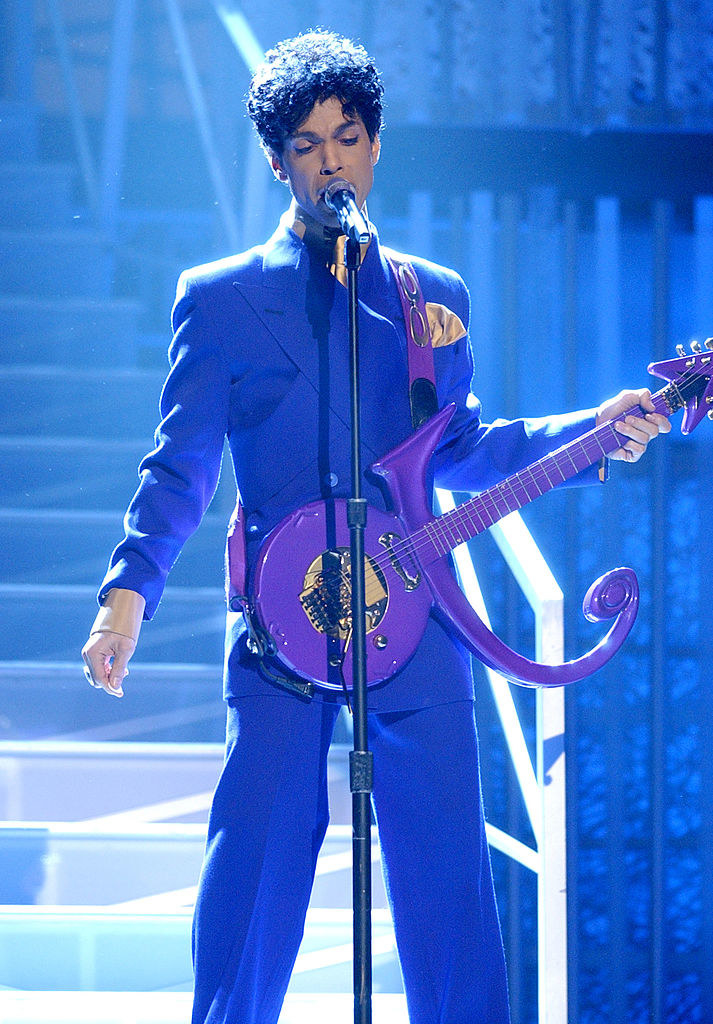 Prince in his signature color on stage