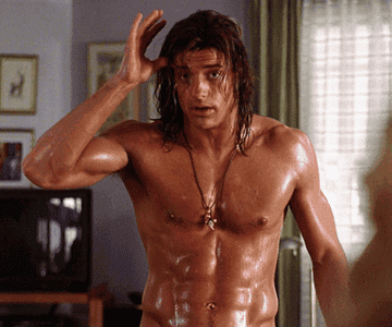 Brendan Fraser topless and covered in oil in George of the Jungle