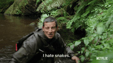 A man in the wild saying I hate snakes