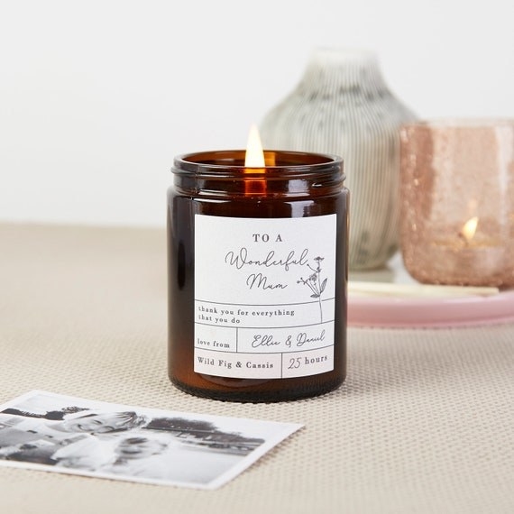 candle burning with the message &quot;to a wonderul mum&quot; on the label