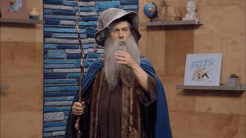 a gif of Chris parnell in comedy bang bang dressed as a wizard