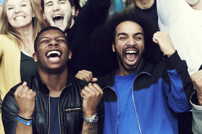 Crowd of sports fans cheering