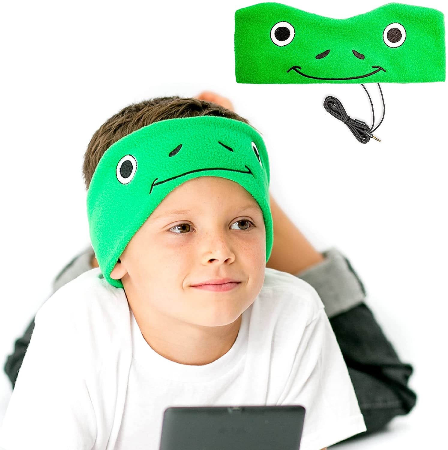 Child wearing frog-themed wrap around headband earphones