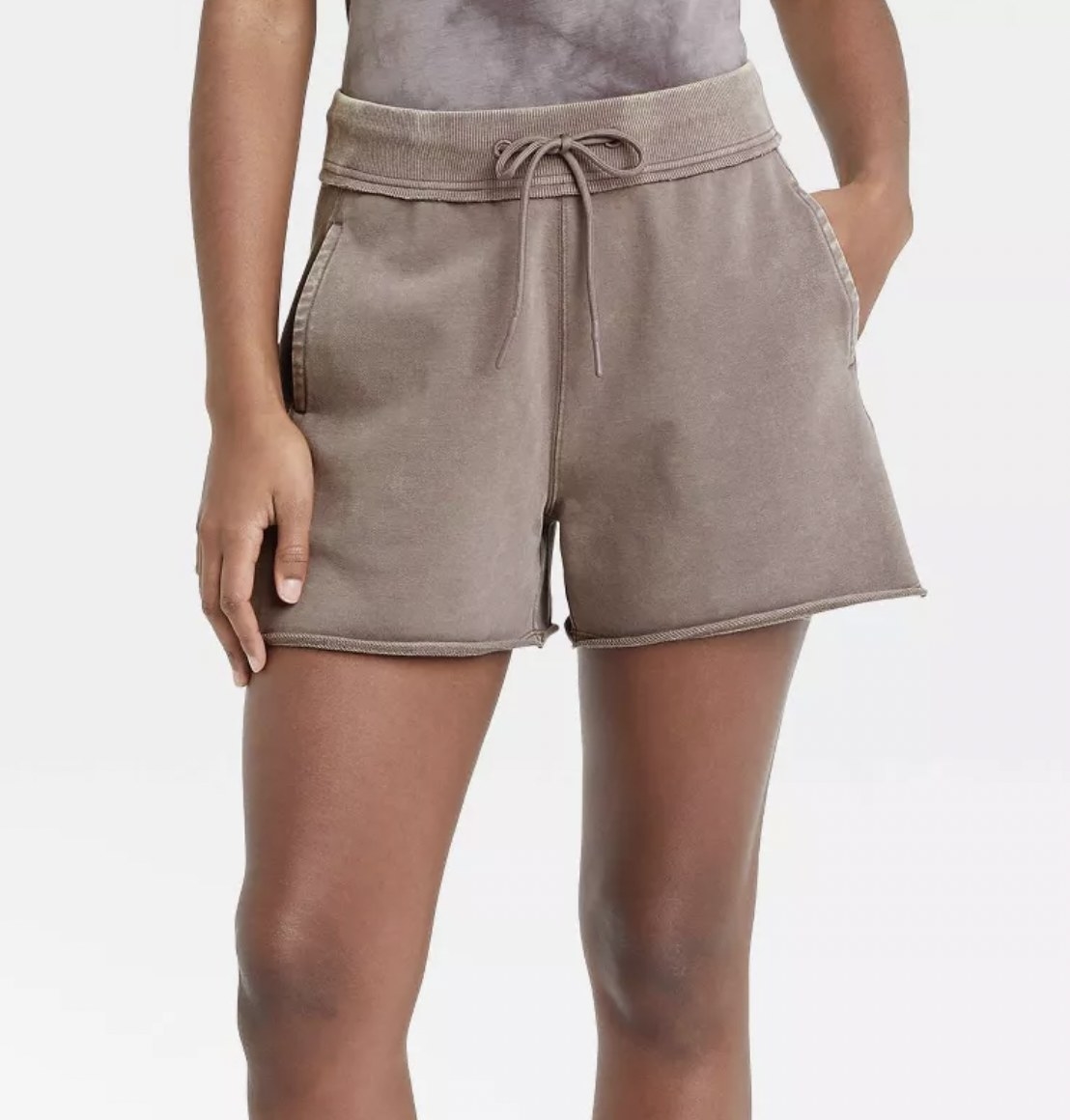 model wearing the shorts in brown