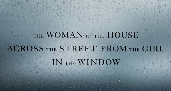The title &quot;The Woman In The House Across The Street From The Girl In The Window&quot; on a raindrop-covered background