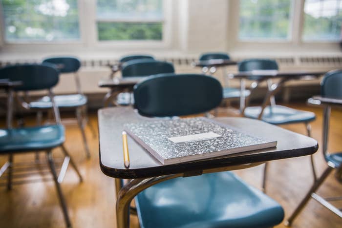 Student desks in an empty classroom