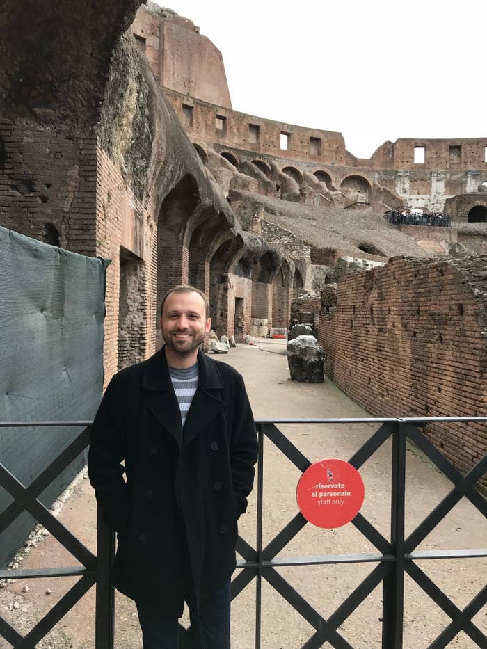 A photo of me standing in the Colosseum in Rome