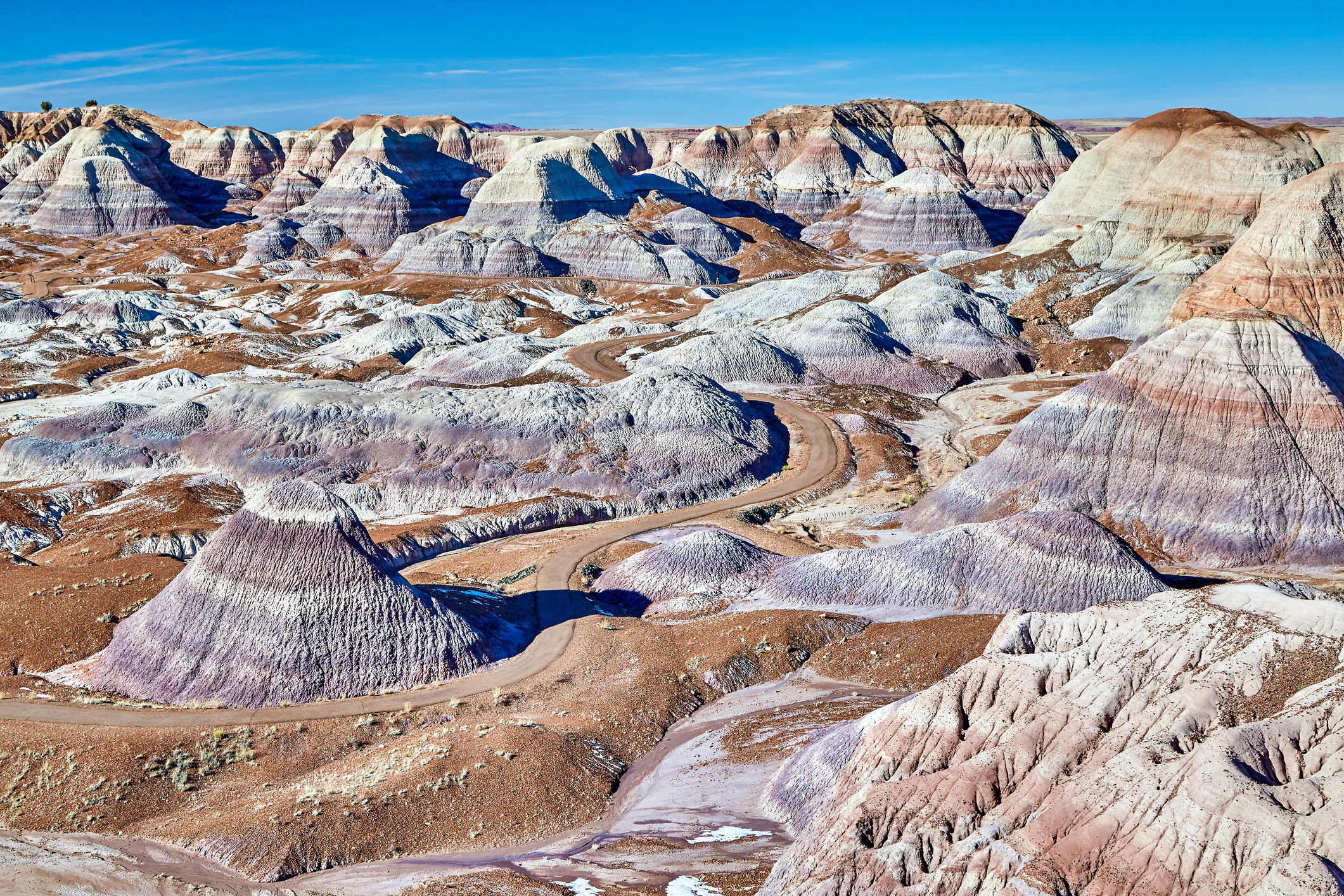 Badland hills of bluish bentonite clay at Blue Mesa Petrified Forest National Park, Arizona, USA