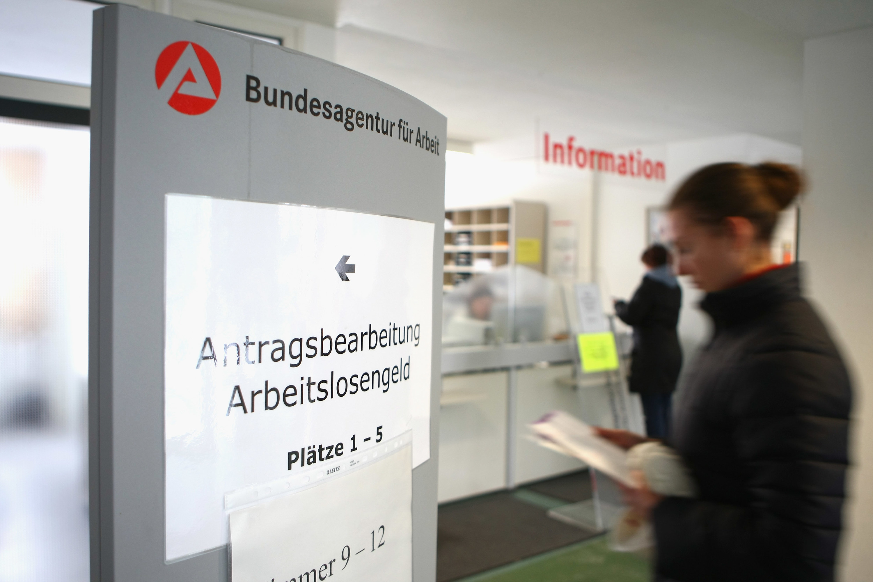 Person waiting in line at the German unemployment office