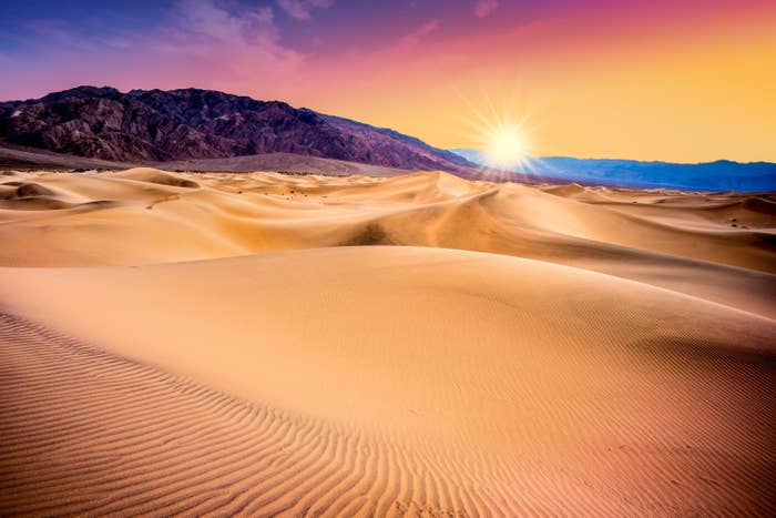 Death Valley, California sand dunes with colorful sunset