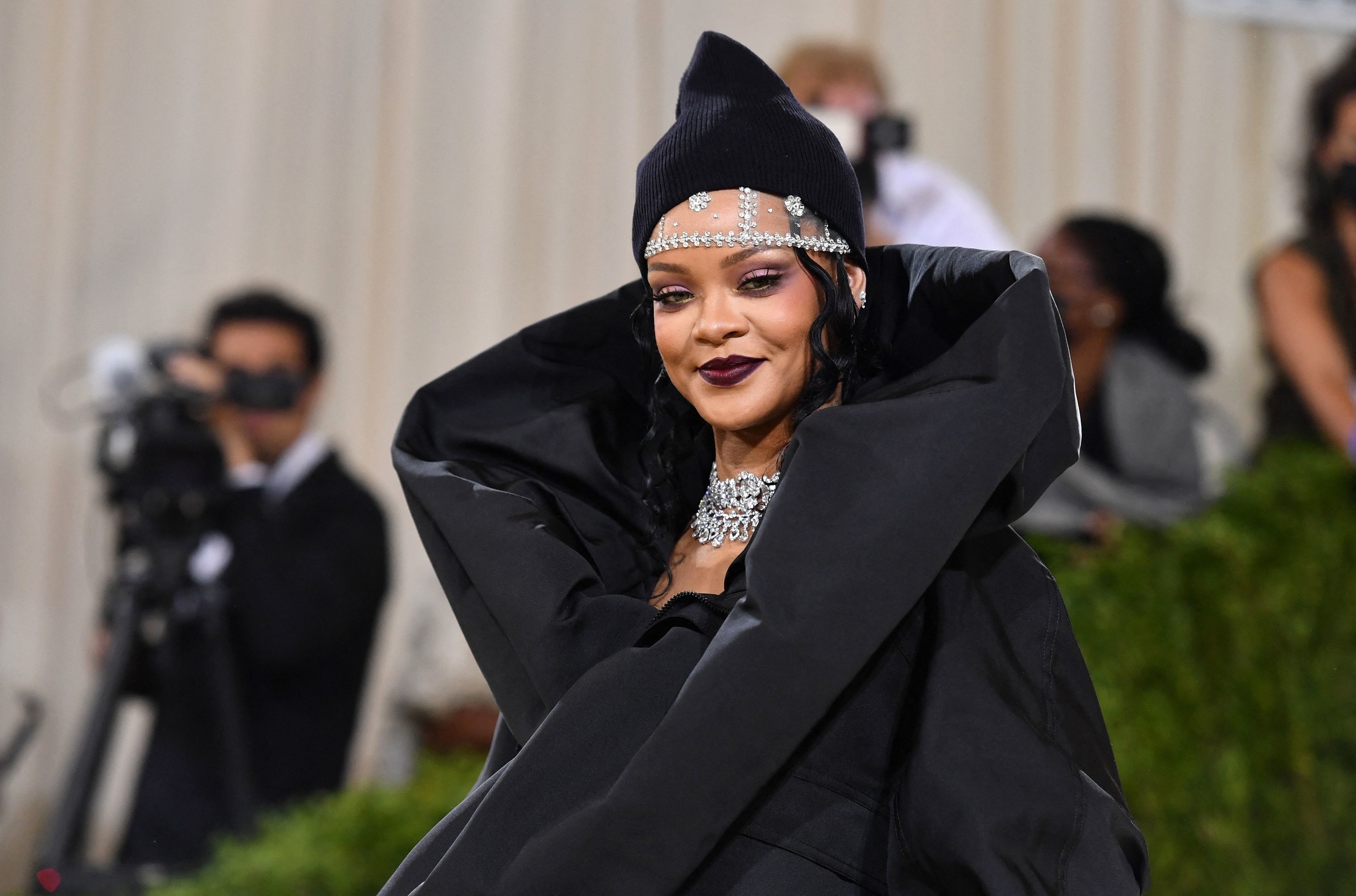 Rihanna posing at the 2021 Met Gala red carpet