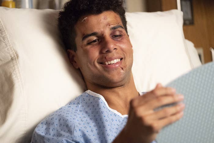 Mason as a patient in a hospital smiling