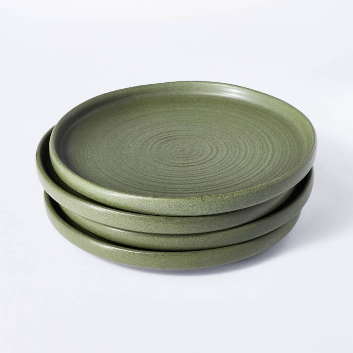 round green stoneware plates with short vertical walls