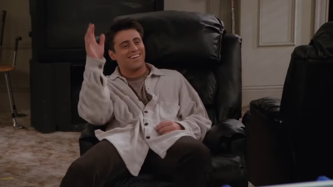 Joey waving &quot;hi&quot; in his lounge chair in &quot;Friends&quot;