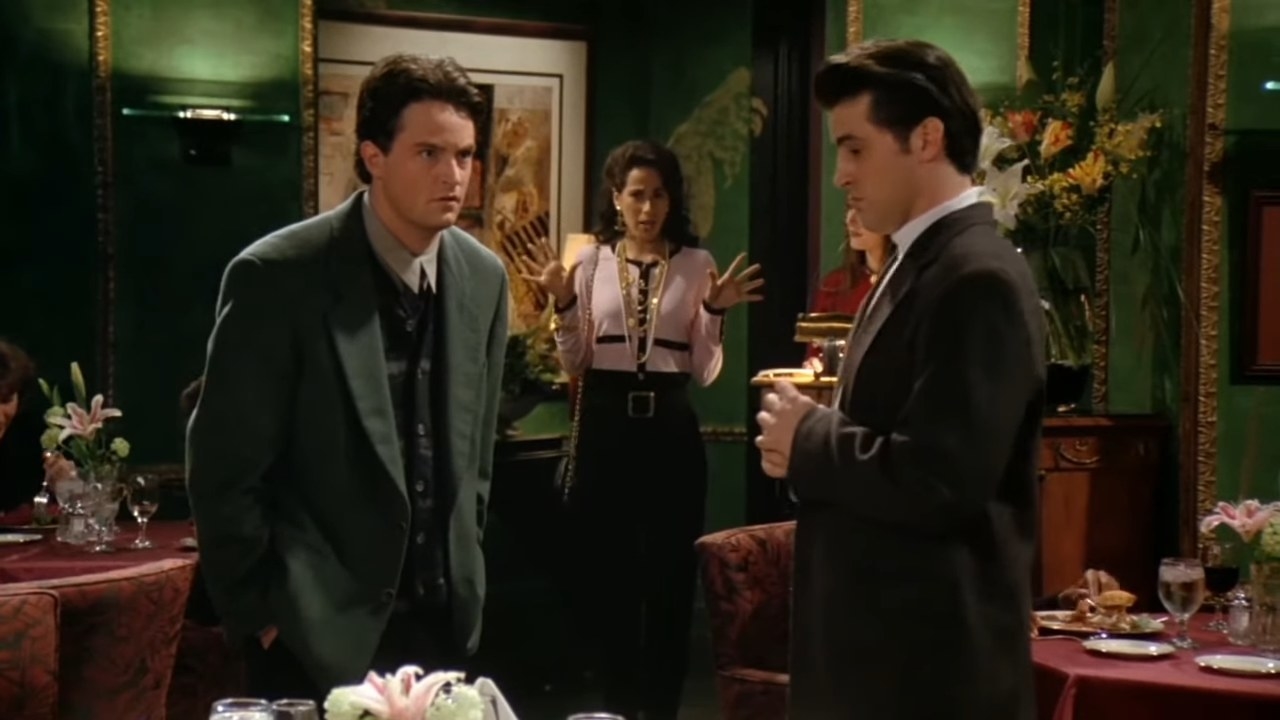 Joey and Chandler with Janice in the background in &quot;Friends&quot;