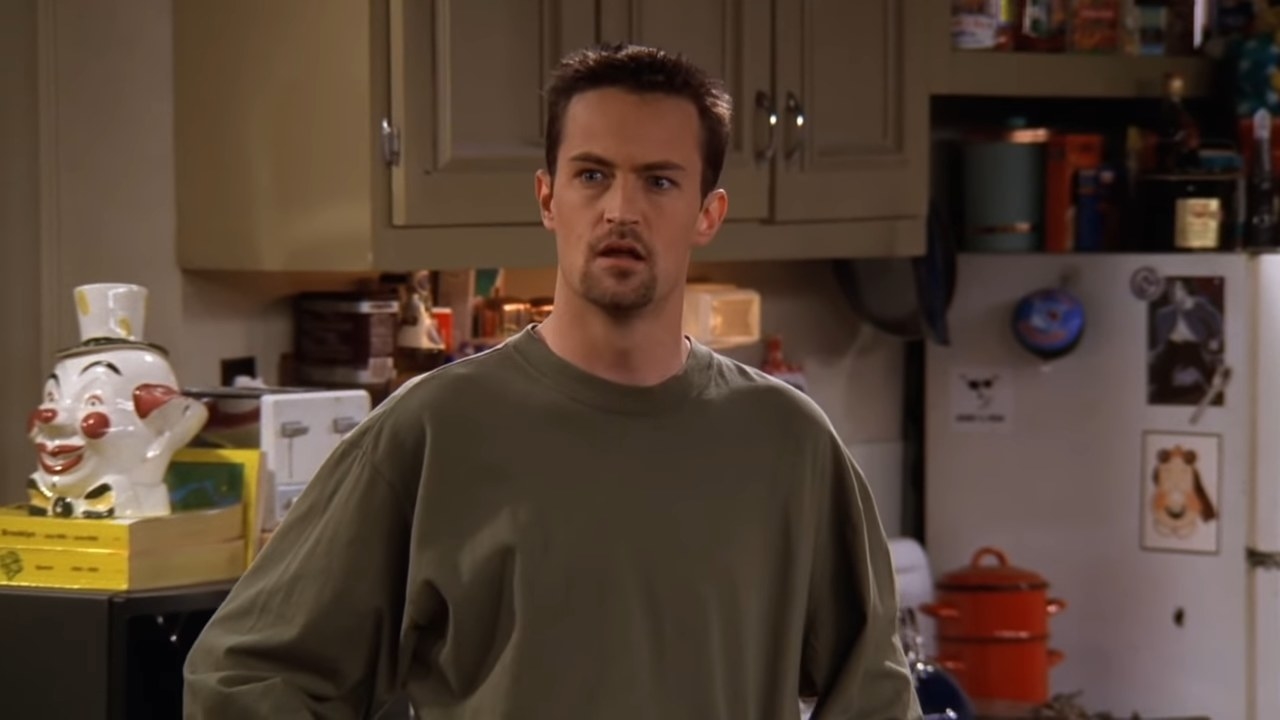 Chandler standing in his apartment with a beard, angry at Joey, in &quot;Friends&quot;