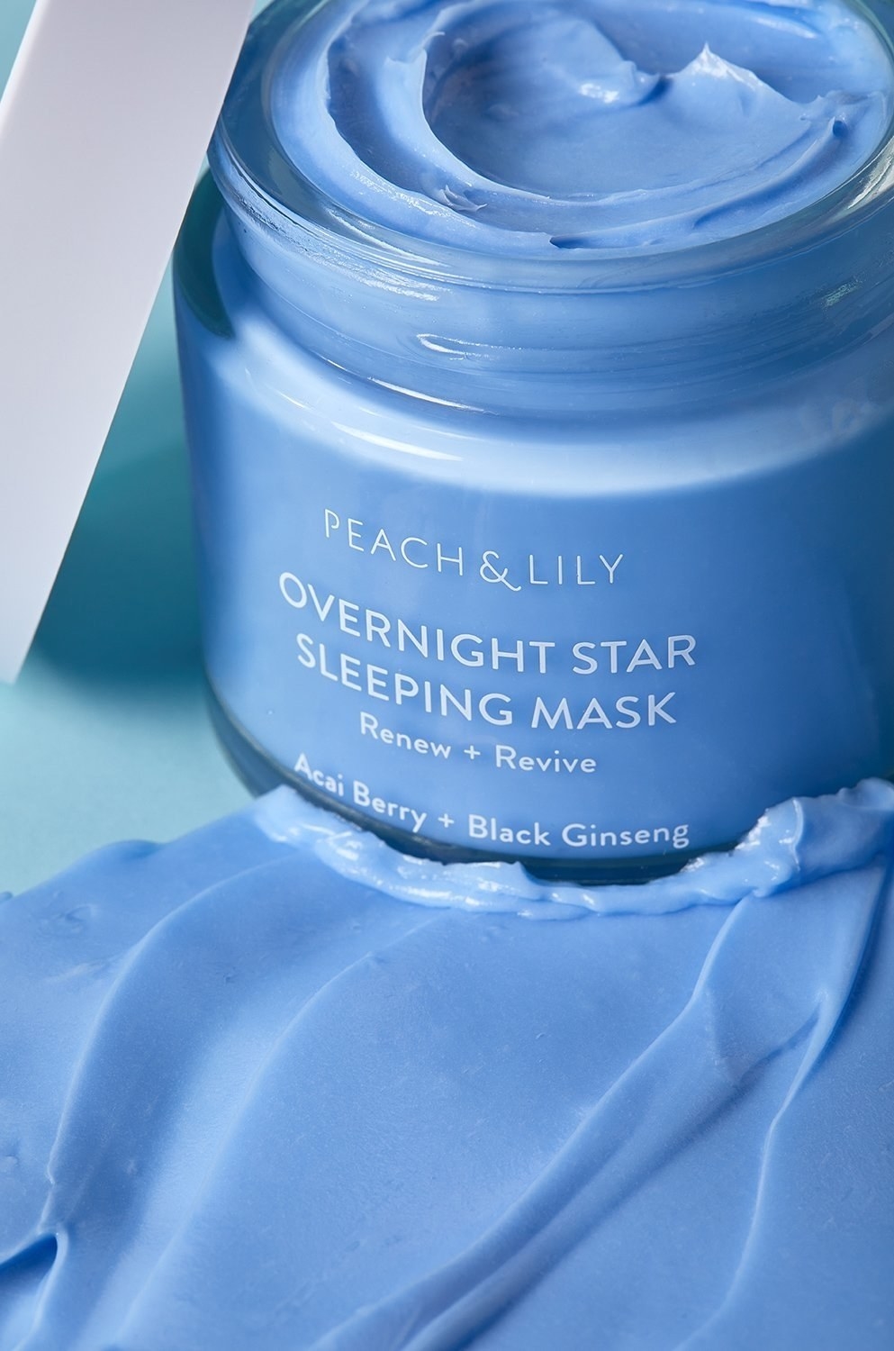 the blue bottle of night cream showing how rich and silky it is