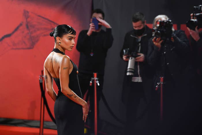 Zoë posing on the Batman red carpet