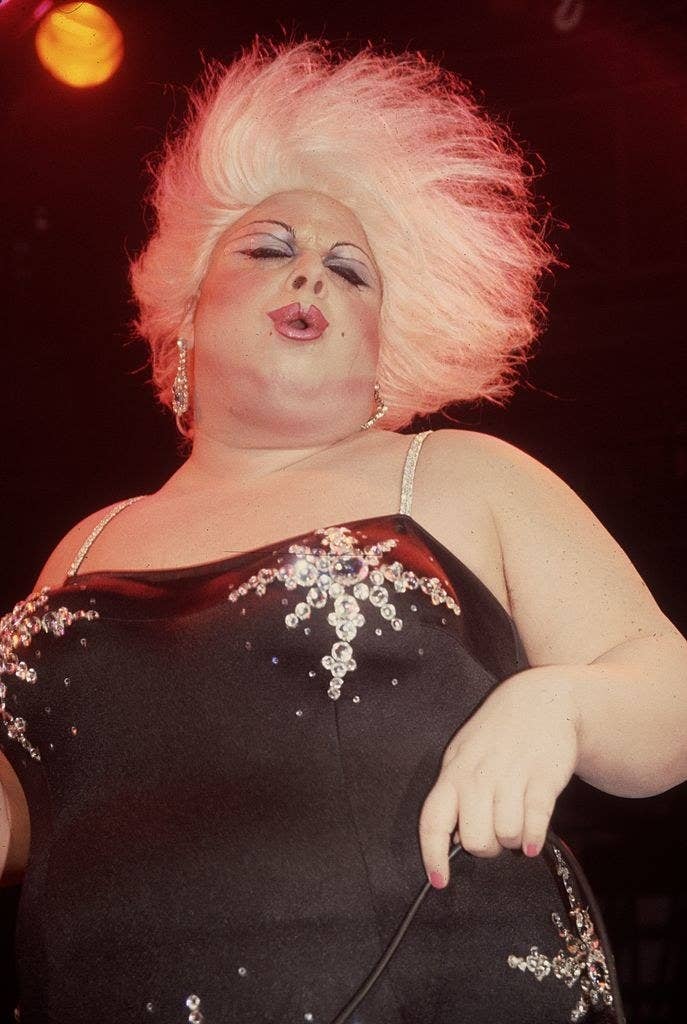 Divine performing onstage