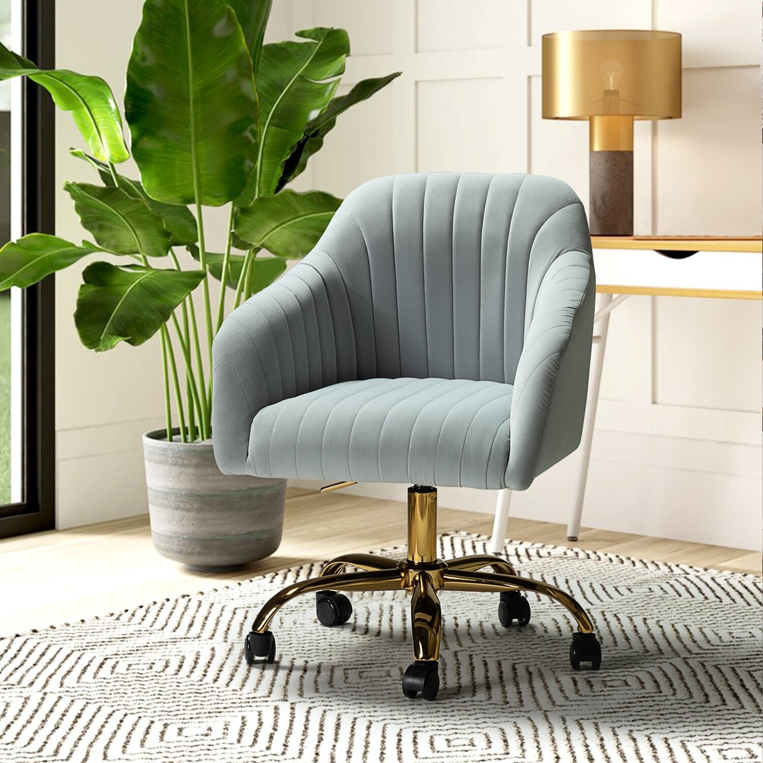 the upholstered chair in grey