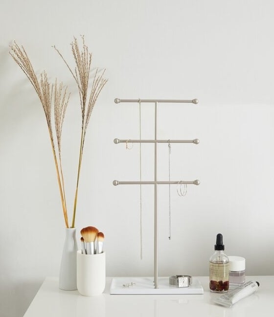 the three-tier metal jewelry stand