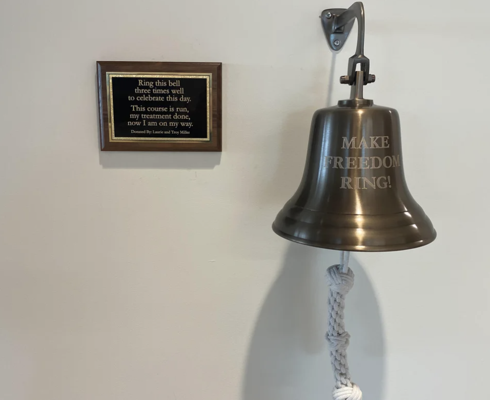 A bell on a wall that says, &quot;Make freedom ring&quot;