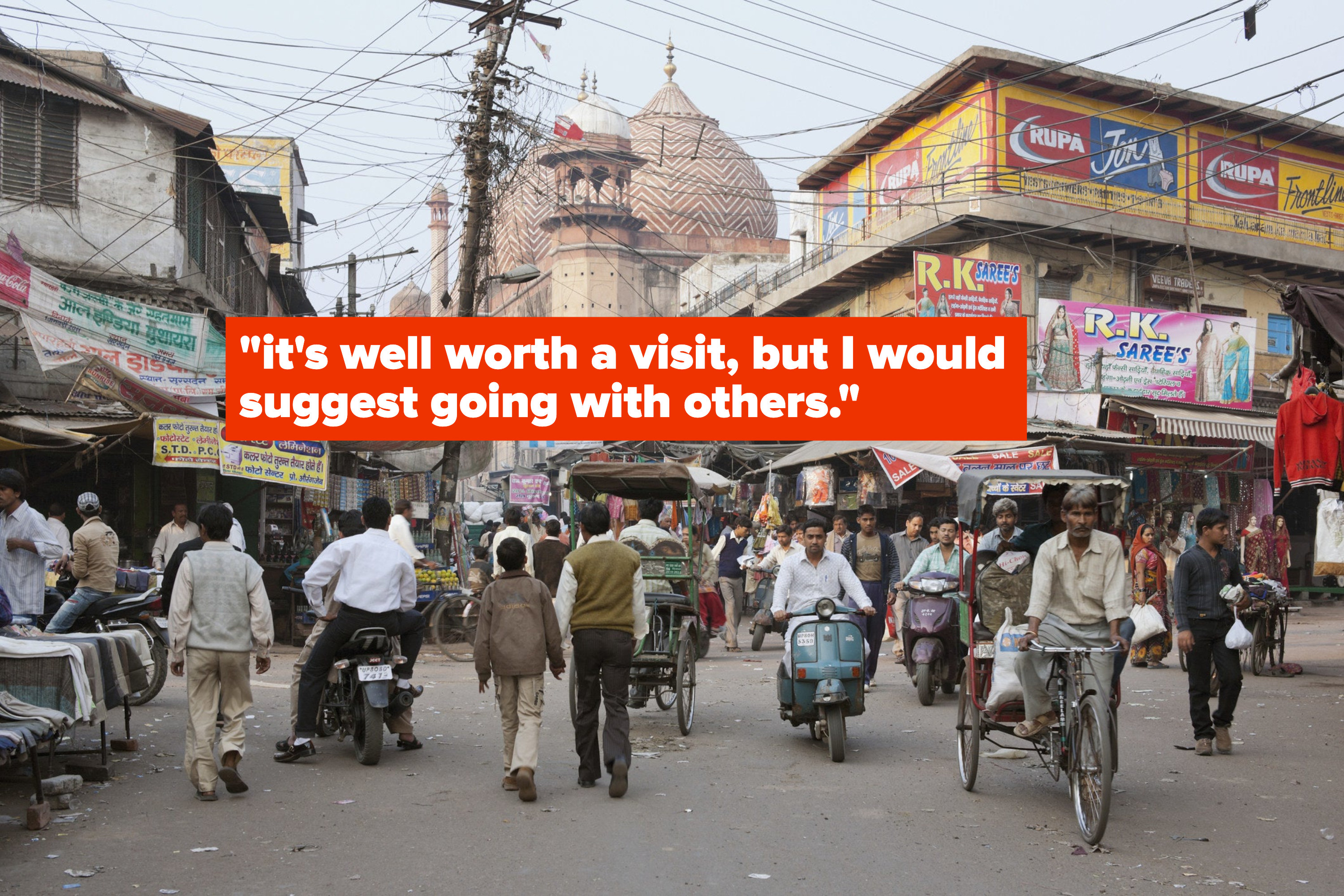 A busy street with traffic in India