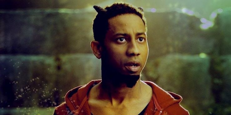 Brandon T. Jackson as Grover Underwood wearing a hoodie. He has small horns coming out of his head and he&#x27;s standing in front of a wall.