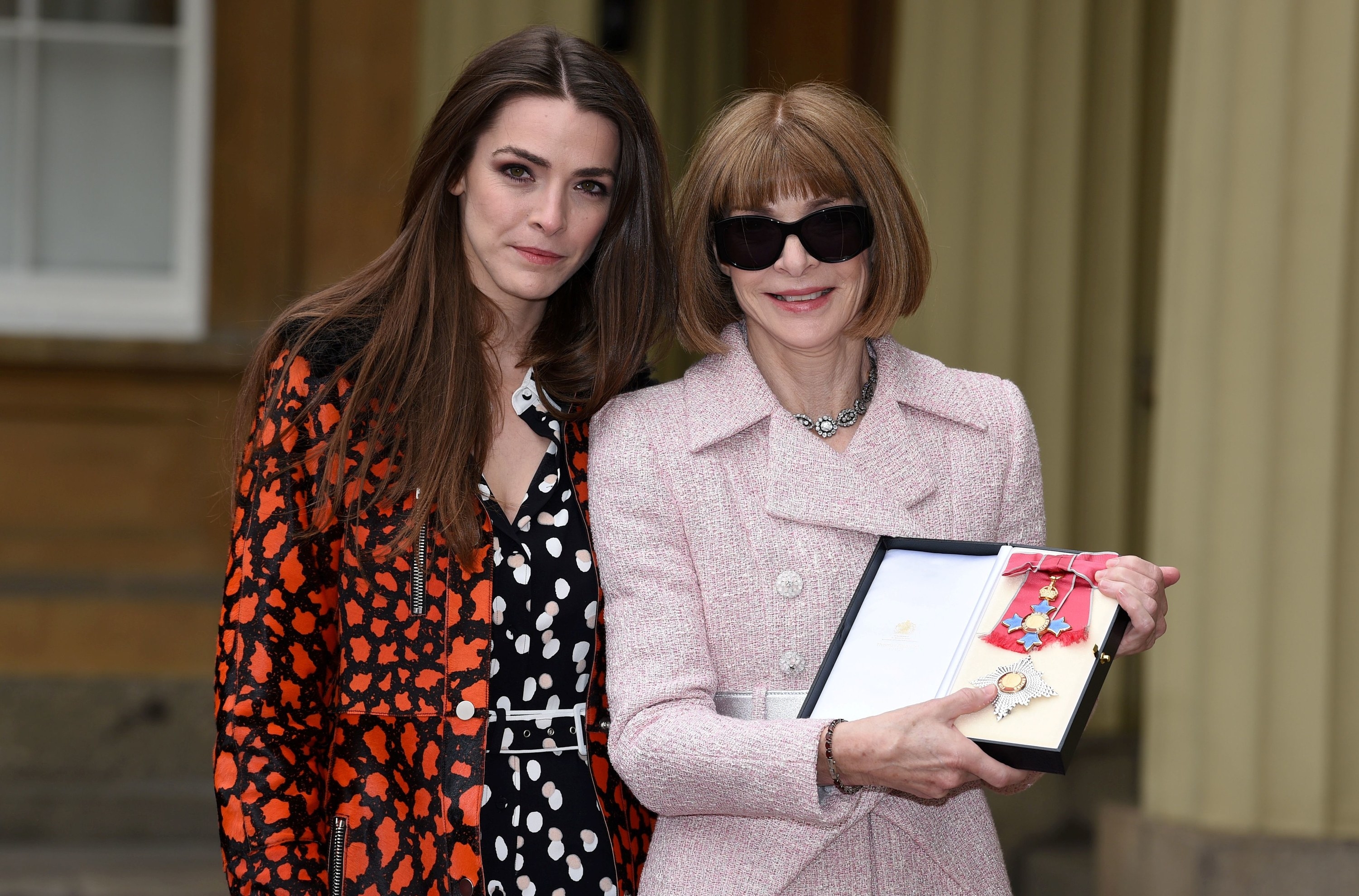 Anna Wintour smiling with her award