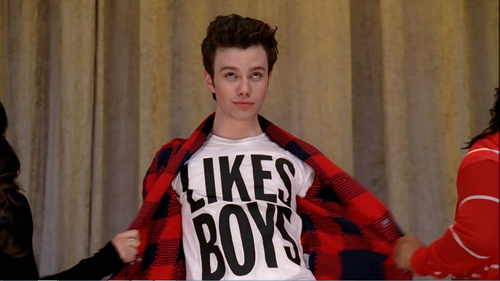 Chris Colfer as &quot;Kurt&quot; from Glee has his cardigan open, showing off his top proudly