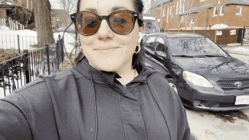 woman running outside with dog
